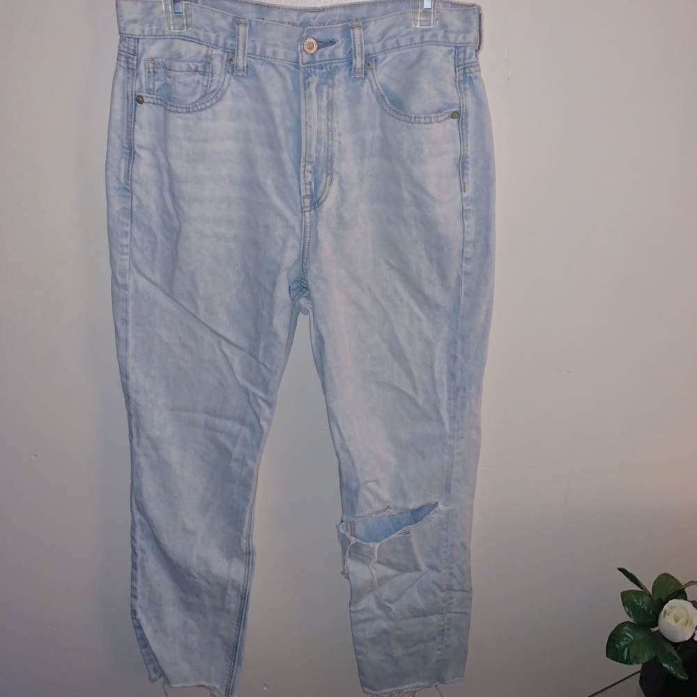 Distressed denim jeans